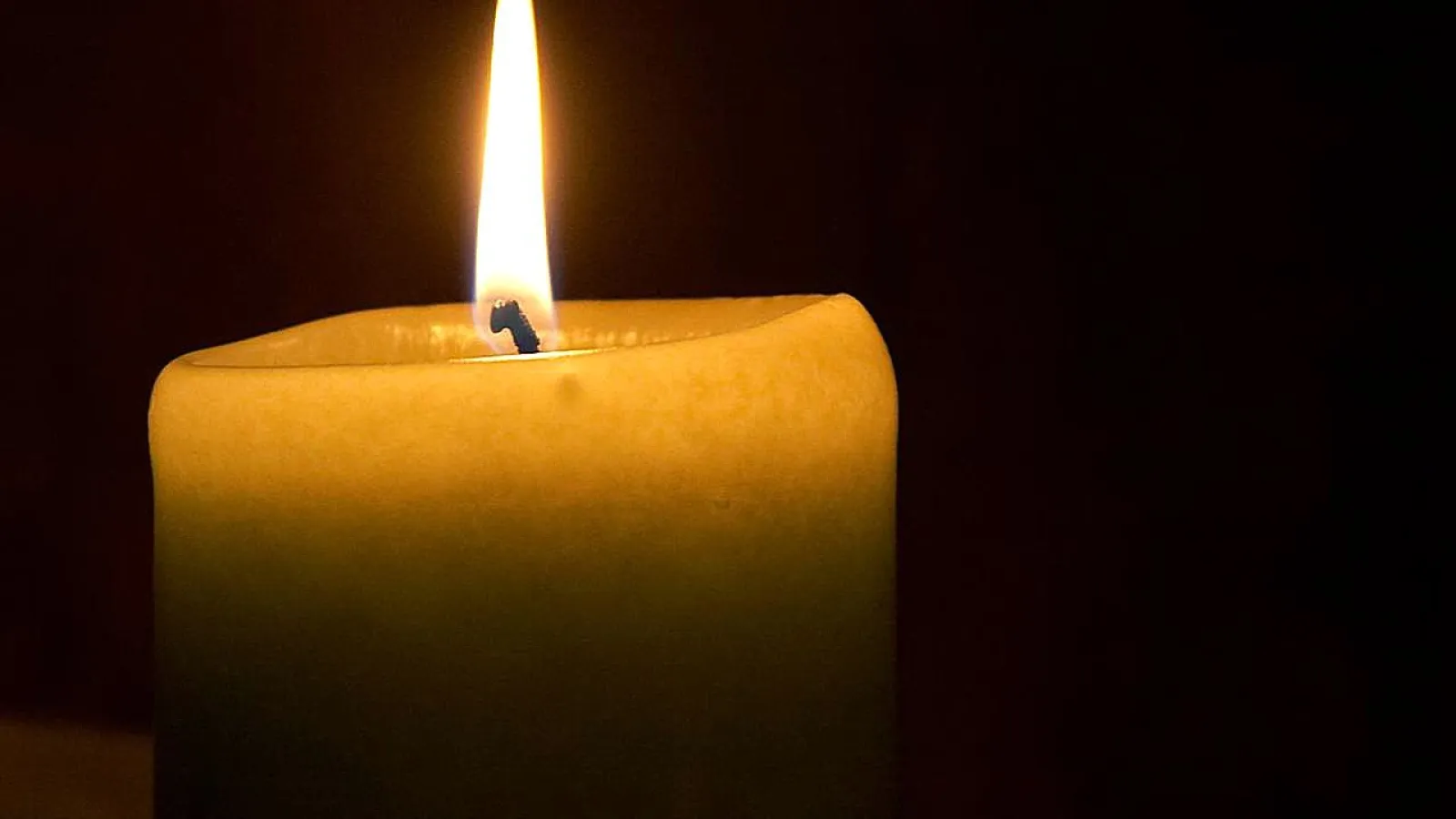 Candle with a dark background