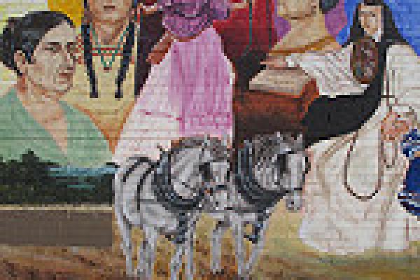 Pilsen mural showing five latinx women and two draft horses.
