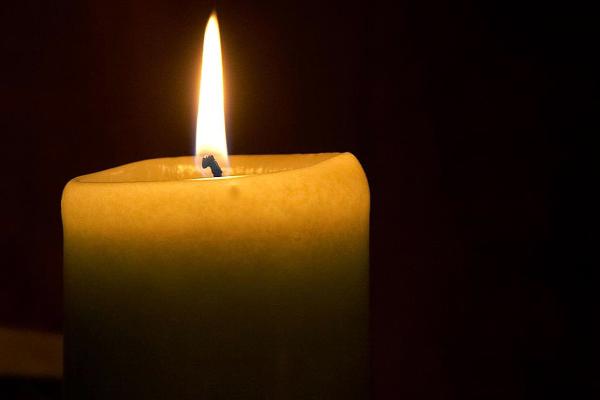 Candle with a dark background