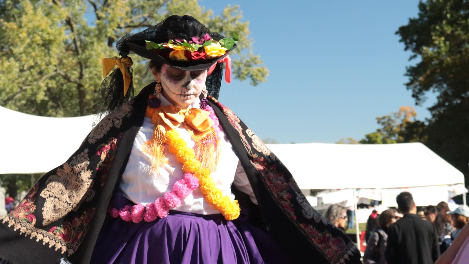 A women in a skeleton costume